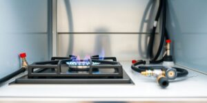 Gas hob, flame, catering unit, safety equipment