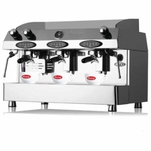 Modern three-group automatic coffee machine on café counter