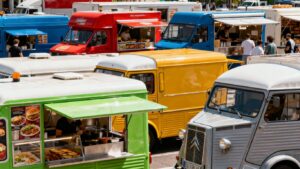 Various colourful food vans for sale in the UK.