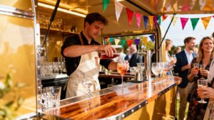 Mobile bar at a UK event serving drinks.
