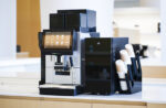 Jetinno bean to cup coffee machine with milk fridge beside it
