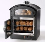 King Edward Classic 25 potato oven with the door open and jacket potatoes inside