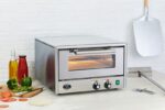 King Edward Colore pizza oven in stainless steel on a counter
